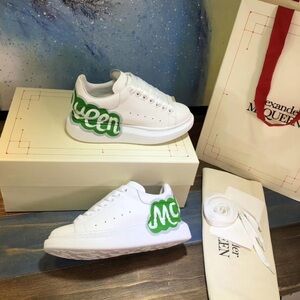 Alexander McQueen White Sneakers with Green Logo
